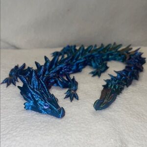 Blue and Green Reptile 3D printer